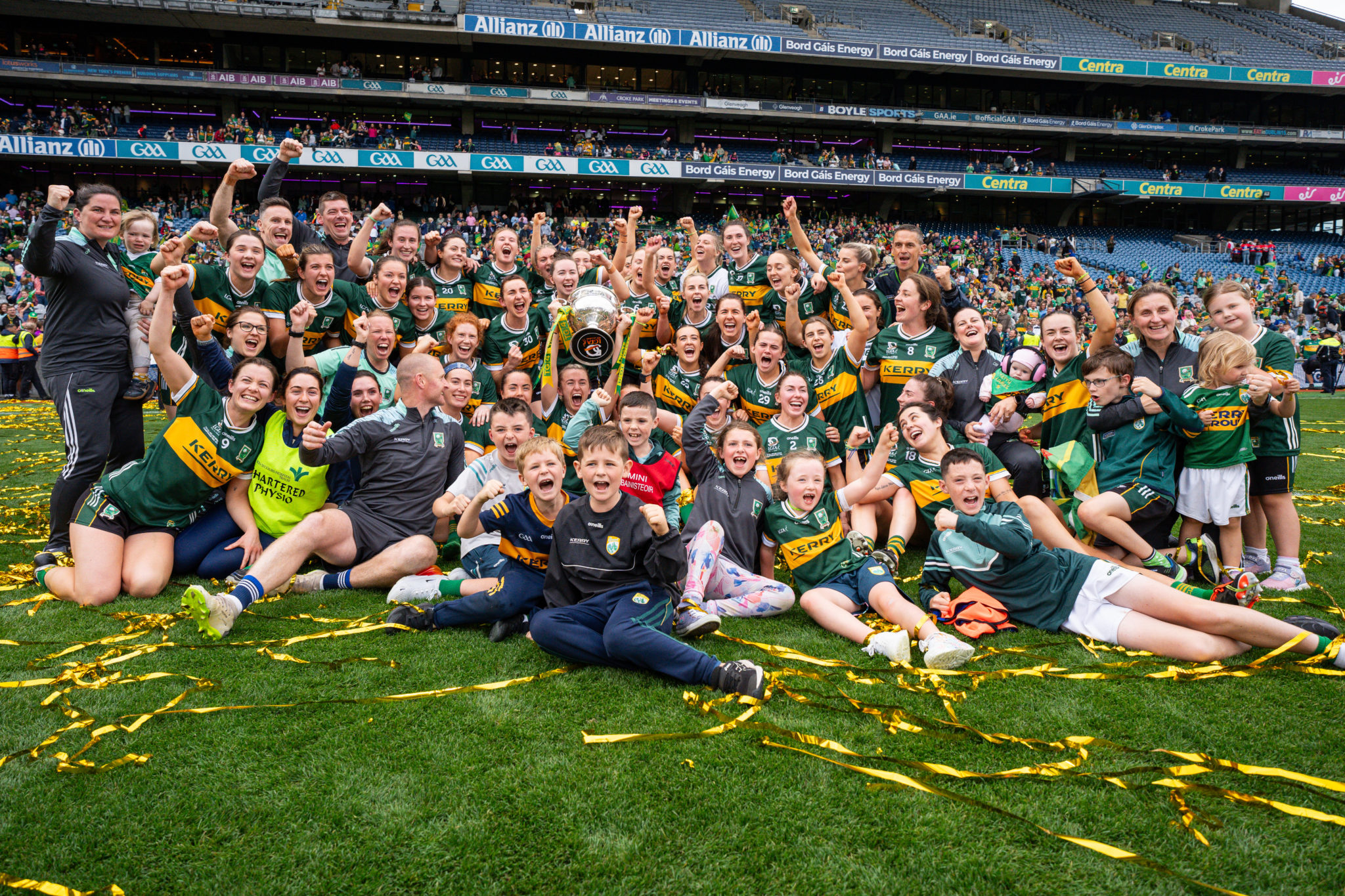 Kerry team, management and family members celebrate their All-Ireland success.