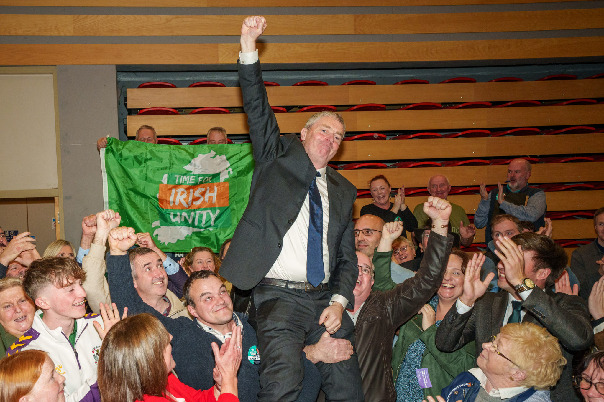 Deputy Pa Daly celebrates being elected on count 7 at the Kerry General Election count centre in the Killarney Sports and Leisure Centre