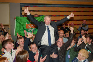 Deputy Pa Daly celebrates being elected on count 7 at the Kerry General Election count centre in the Killarney Sports and Leisure Centre