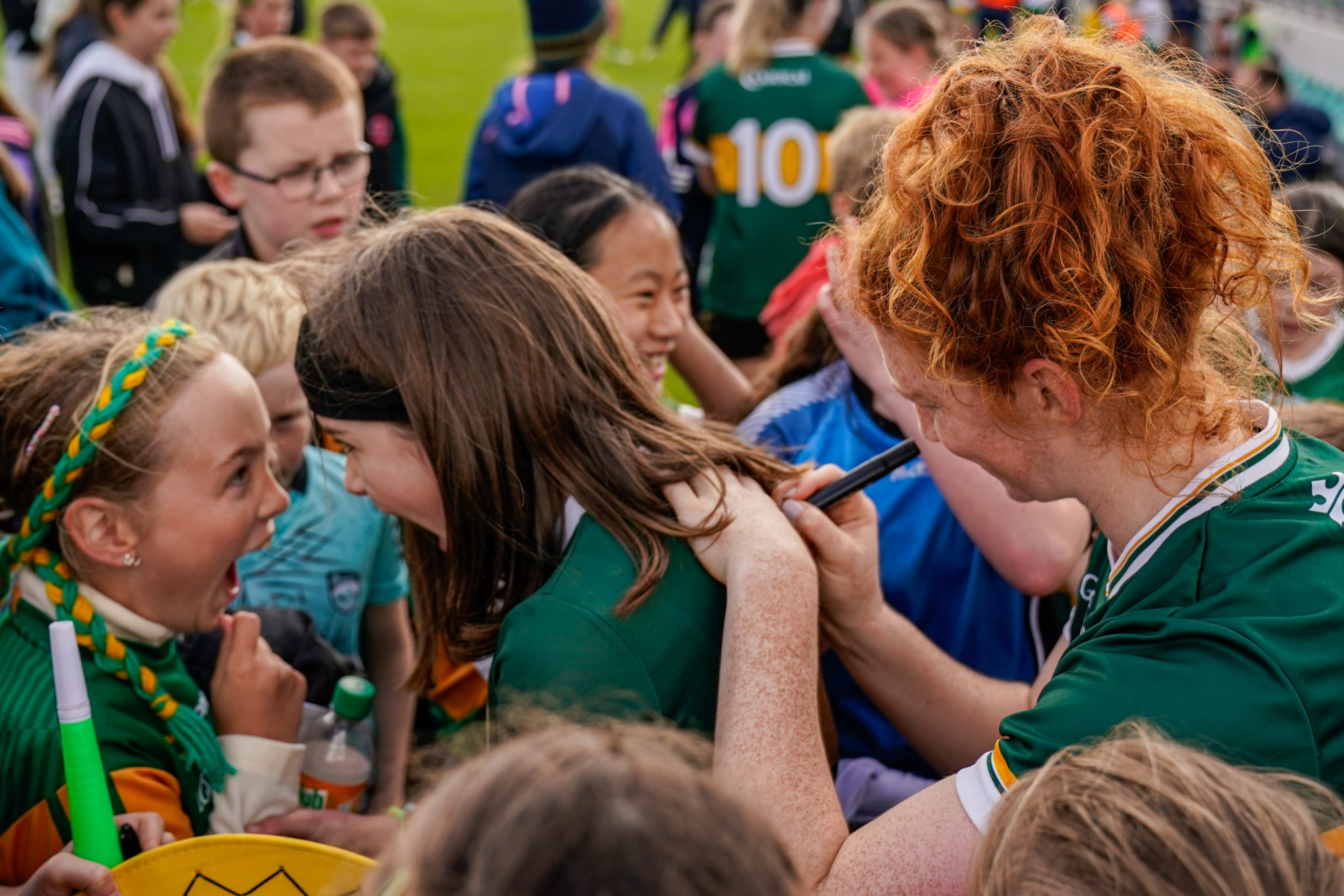 Two Kerry supporters share their excitement when meeting Louise Ní Mhuircheartaigh after todays match 