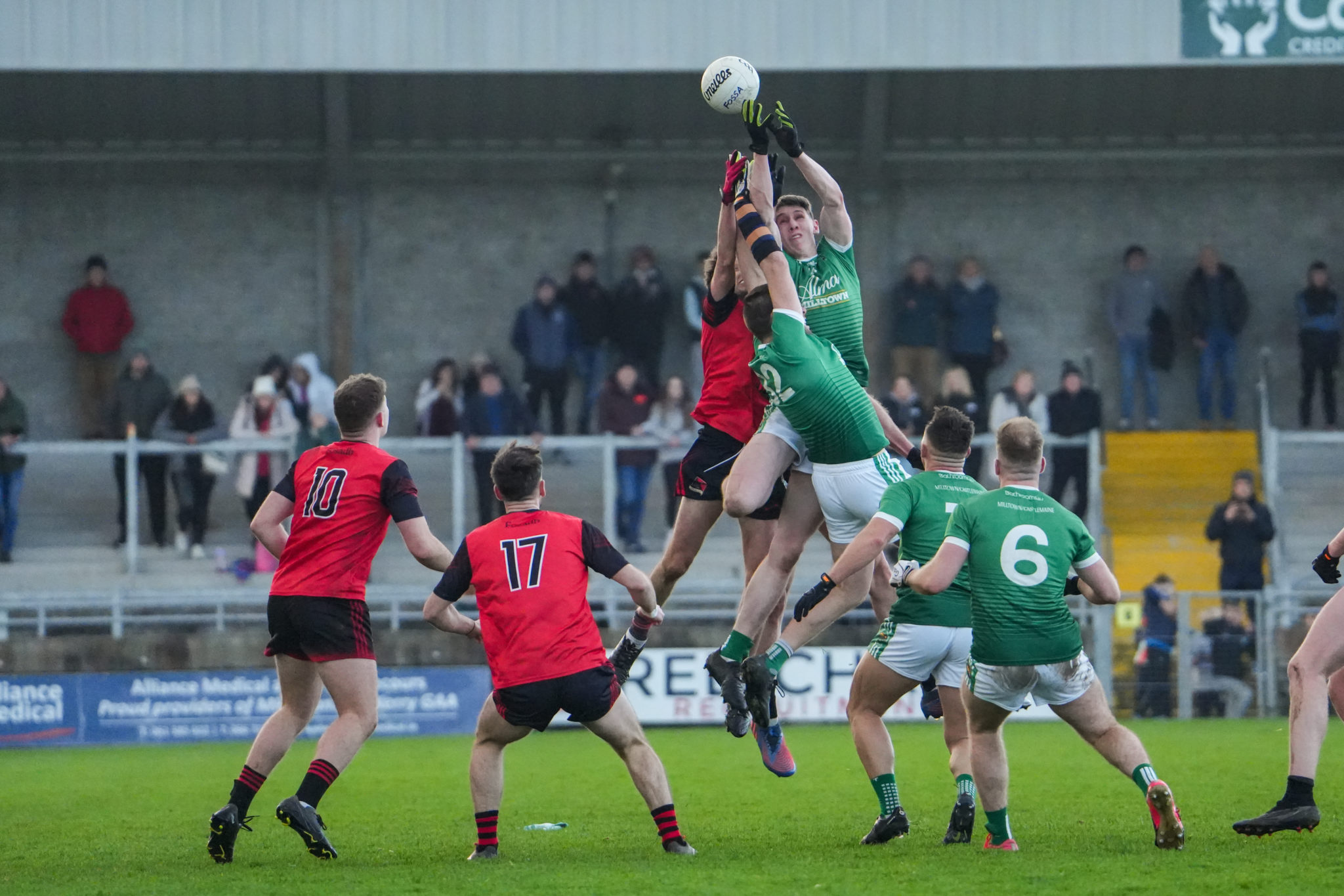 Milltown/Castlemaine's Cillian Burke leaps for the ball against Fossa in the Kerry Petroleum Intermediate Club Football Championship Final | Photo by David Corkey Radio Kerry Sport